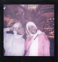 two women in hijabs posing for a photo