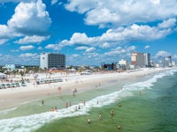 a beach with a lot of people on it