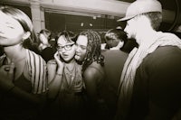 black and white photo of people at a party