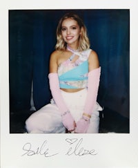 a photo of a young woman posing for a photo