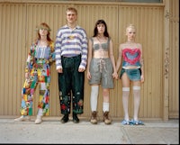 a group of people standing in front of a building