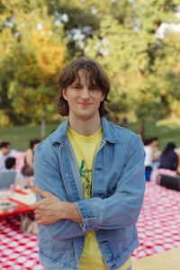 a man wearing a denim jacket