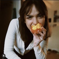 a woman eating an apple